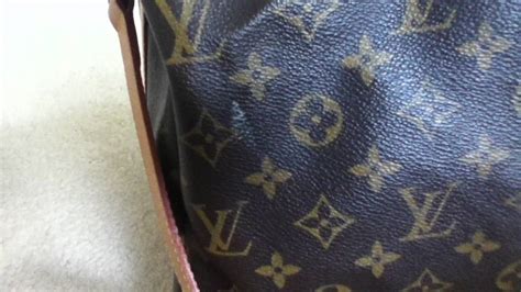 white marks off Louis Vuitton